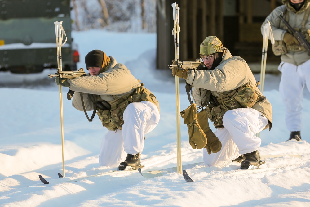 3-71 Cavalry Regiment, 1BCT, 10th Mountain Division train with Finnish soldiers on weapons proficiency using Finland’s RK62 assault rifle during Defense Exercise North in Sodankyla Garrison, Finland, during Exercise Arctic Forge '23 on Feb. 22, 2023