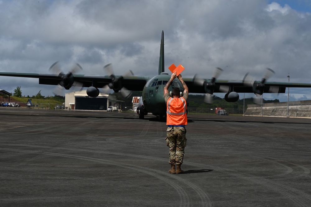 C-27J gets marshaled in at Palau International Airport