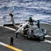 Sailors Perform Maintenance On Aircraft