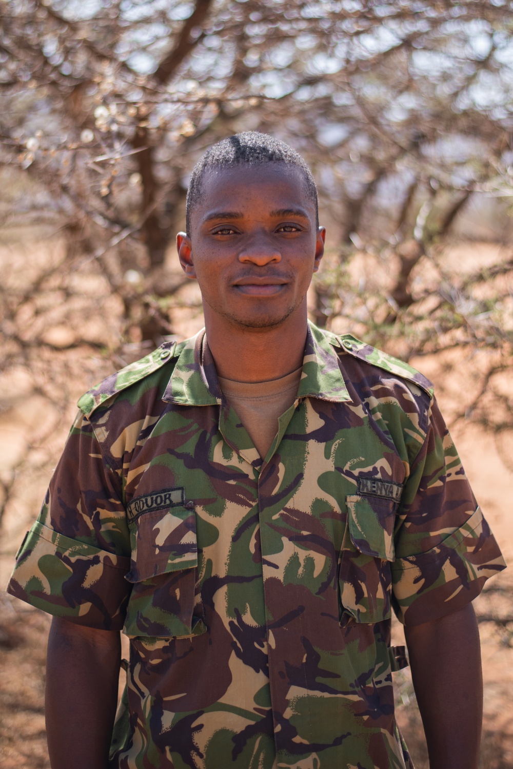 Kenyan Defence Forces Senior Pvt. Hemstone Oduor poses for a photo at JA23