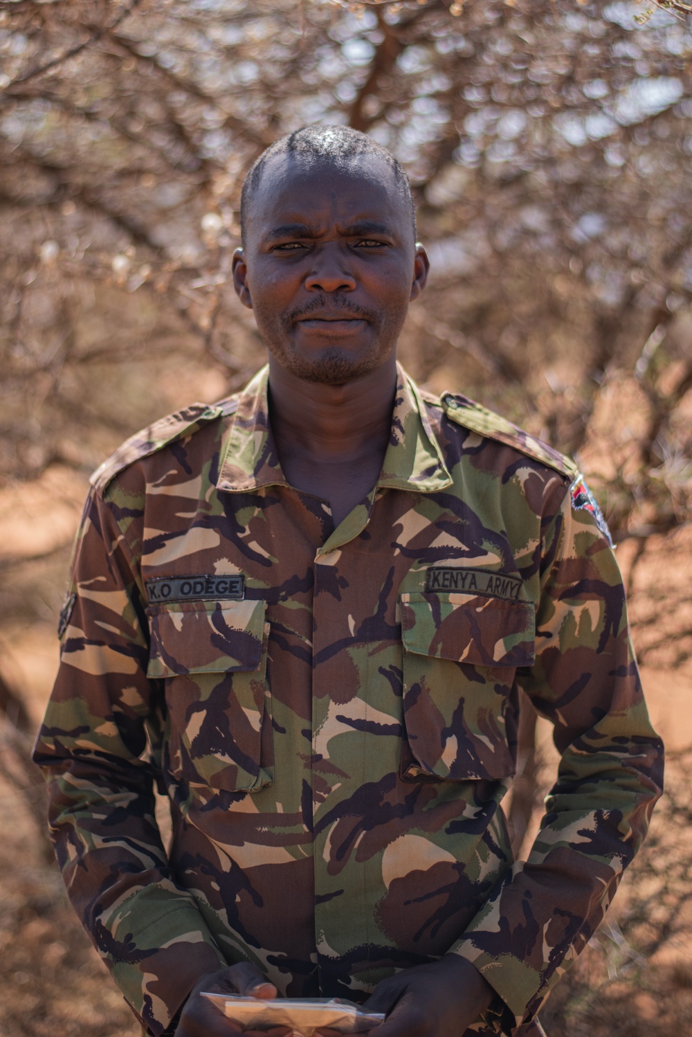 Kenyan Defence Forces Sgt. Kevin Odege poses for a photo at Justified Accord 23