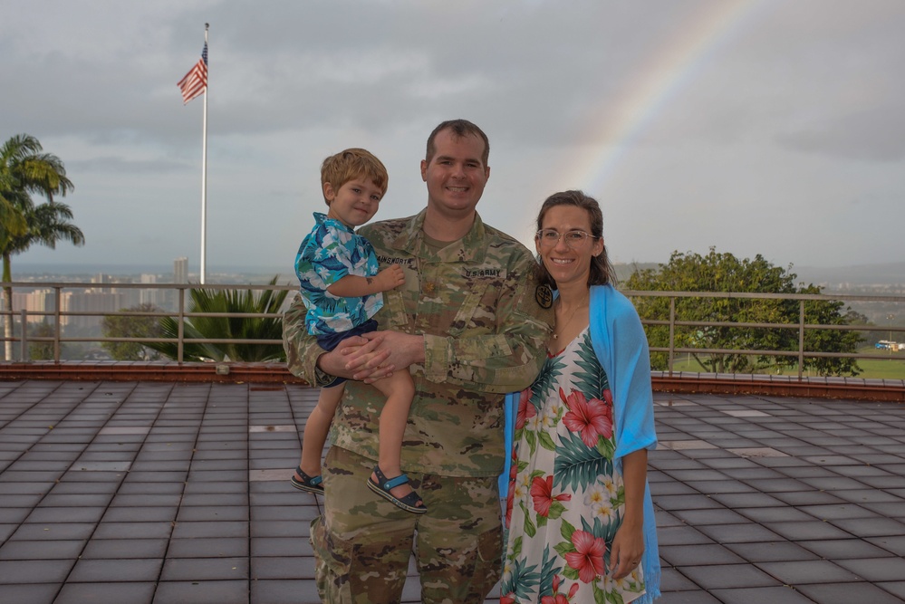 Maj. Jeffrey Hainsworth receives DCO coin from Navy Capt. Ian Fowler