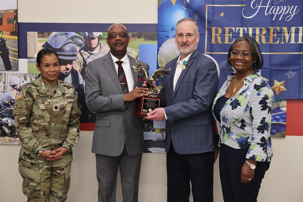 Civilian Senior Communications Mission Planner retires from service after 41 years