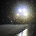 Snow removal operations after dark at Fort McCoy