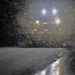 Snow removal operations after dark at Fort McCoy