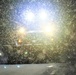 Snow removal operations after dark at Fort McCoy