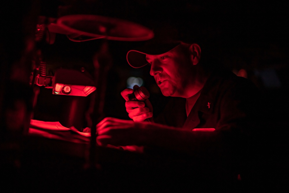 A U.S. Navy Chaplain Says An Evening Prayer For The Crew