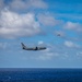 A P-8 Poseidon Flies By The Nimitz