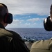 A P-8 Poseidon Flies By The Nimitz