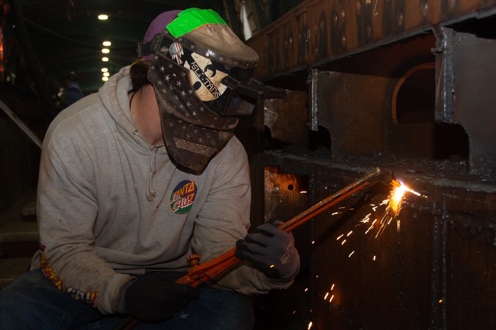 contractor repairs catapult