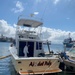 Coast Guard, clean-up crews remove pollution threat from partially sunken vessel in San Juan Harbor, Puerto Rico