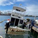 Coast Guard, clean-up crews remove pollution threat from partially sunken vessel in San Juan Harbor, Puerto Rico