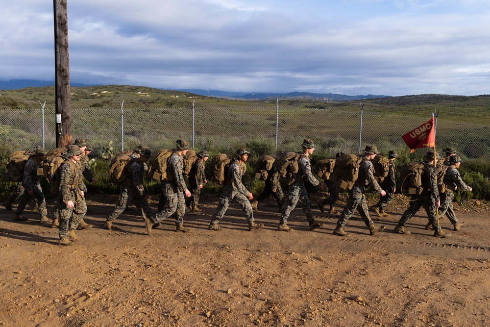 HQ Bn. Marines hike it out