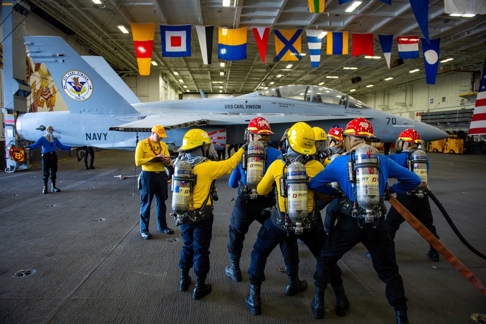 USS Carl Vinson (CVN 70) Sailors Conduct a General Quarters Drill