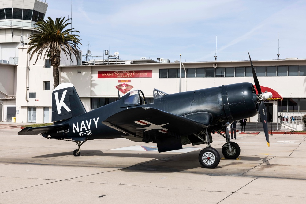 Marine Pilot Honored with Flyover by WWII Era Aircraft He Flew