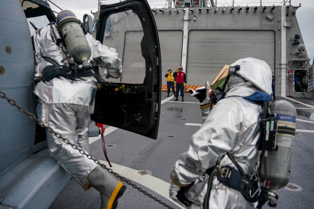 Sailors Aboard USS Oakland Conduct an Aircraft Firefighting Drill
