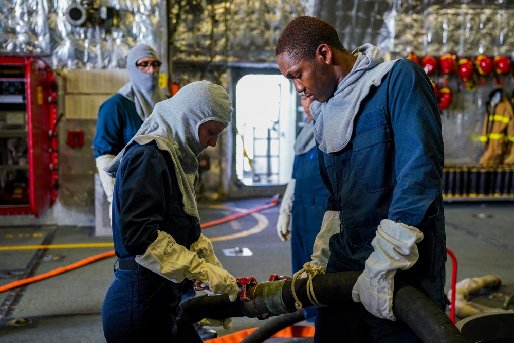Sailors Aboard USS Oakland Conduct a damage control training session