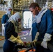 Sailors Aboard USS Oakland Conduct a damage control training session