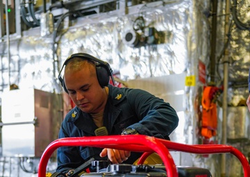 Sailors Aboard USS Oakland Conduct a damage control training session