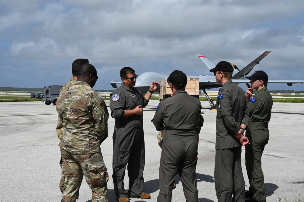 Forces come together to discuss the capabilities of the MQ-9 Reaper unmanned aircraft
