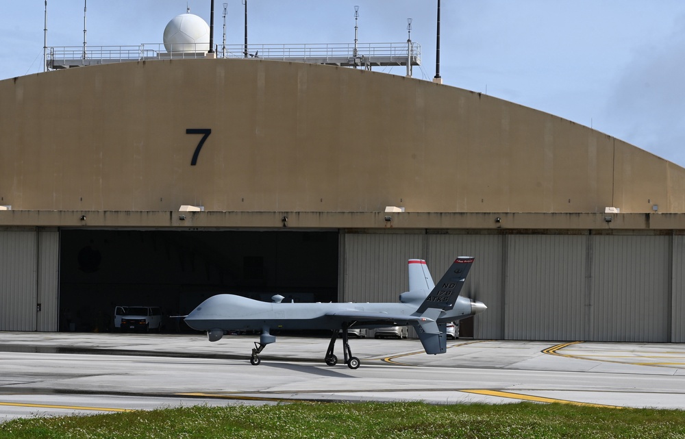 MQ-9 Reaper taxis on flight line during Cope North 23