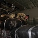 From ground to air, they’ll get it there; 165th Quartermaster Company parachute riggers