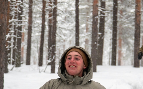 3-71 Cavalry Regiment, 1BCT, 10th Mountain Division train on what to do if a soldier breaks through ice while crossing a river during Defense Exercise North in Sodankyla Garrison, Finland, during Exercise Arctic Forge '23 on Feb. 23, 2023