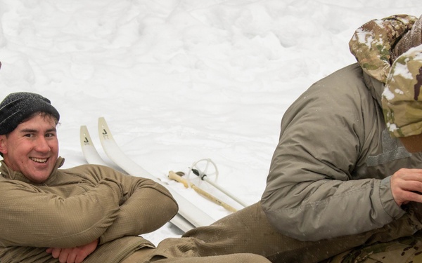 3-71 Cavalry Regiment, 1BCT, 10th Mountain Division train on what to do if a soldier breaks through ice while crossing a river during Defense Exercise North in Sodankyla Garrison, Finland, during Exercise Arctic Forge '23 on Feb. 23, 2023