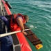 Coast Guard Station personnel rescue two mariners