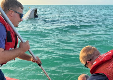 Coast Guard Station personnel rescue two mariners