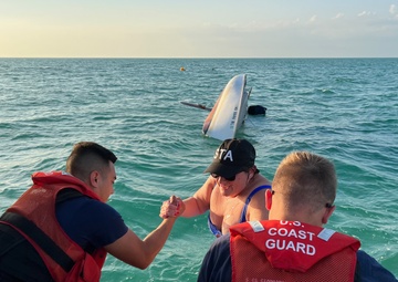 Coast Guard Station personnel rescue two mariners