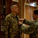 Italian Armed Forces training liaison officer Sgt. Maj. Raffaello Mastromarino recieves the Meritorious Service Medal