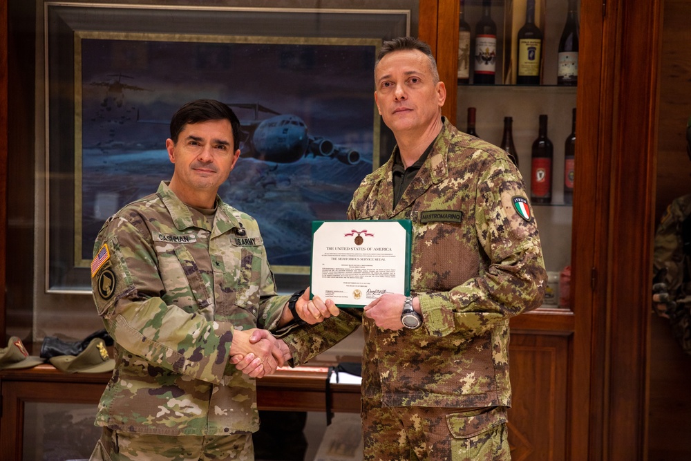 Italian Armed Forces training liaison officer Sgt. Maj. Raffaello Mastromarino recieves the Meritorious Service Medal