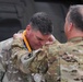 Chief Warrant Officer 5 Matthew Fitter receives the Order of Saint Michael