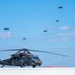 Joint special operations forces preform free falls over Blackhawk unit