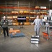 Steven Burrill, NB Coronado 5G smart warehouse logistics program lead, NAVSUP FLC San Diego, introduces OTTO, the Autonomous Mobile Robot, to visitors on a tour of the U.S. Navy‘s first 5G smart warehouse on NAS - North Island, Feb. 15.