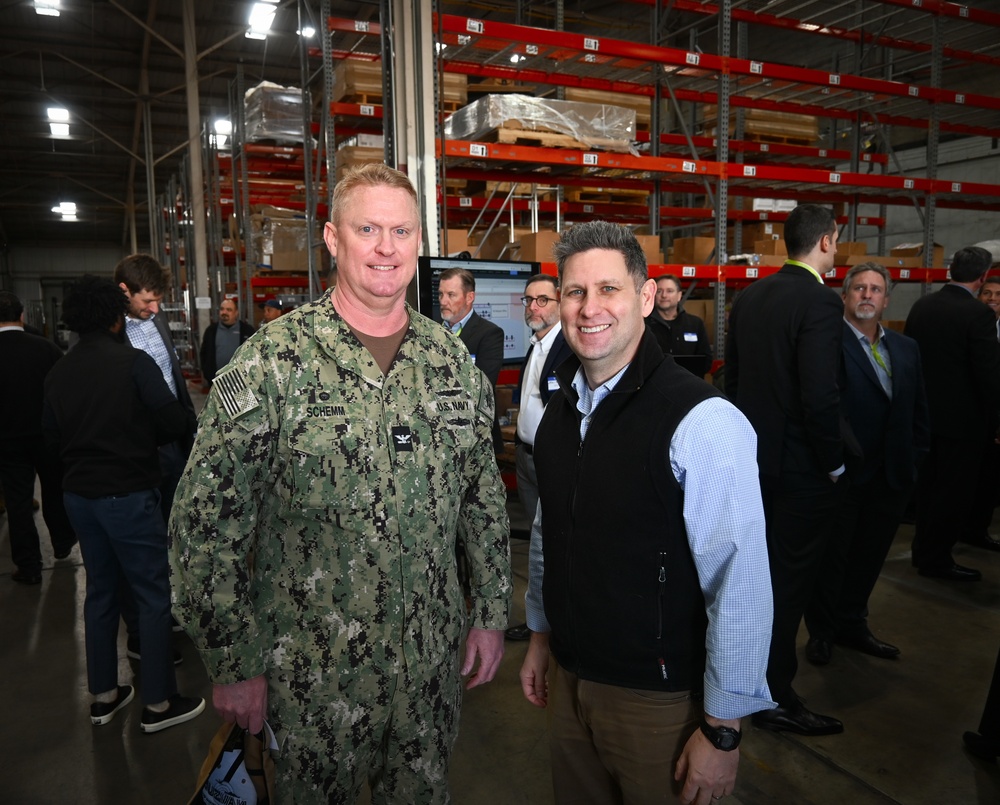 Capt. Cory Schemm, commanding officer, NAVSUP Fleet Logistics Center San Diego, meets with Russell Rumbaugh, Assistant Secretary of the Navy (Financial Management &amp; Comptroller) at the U.S. Navy‘s first 5G smart warehouse on NAS - North Island, Feb.15.