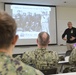 Sailors from Naval Medical Readiness Logistics Command receive a history presentation as part of African American History Month