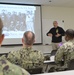 Sailors from Naval Medical Readiness Logistics Command receive a history presentation as part of African American History Month