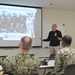 Sailors from Naval Medical Readiness Logistics Command receive a history presentation as part of African American History Month