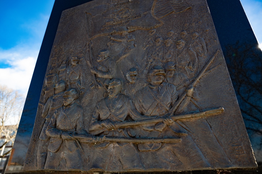 DVIDS - News - Soldiers re-up under Crossed Swords monument