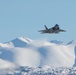 F-22 Raptors ascend above Alaska