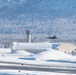 F-22 Raptors ascend above Alaska