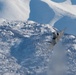 F-22 Raptors ascend above Alaska