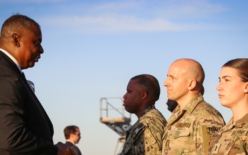 Secretary of Defense Visits and Honors Coalition Forces