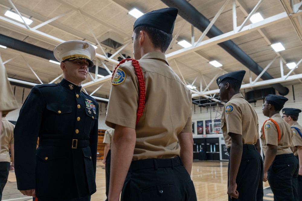 U.S. Marines with MWHS-2 inspect and engage with NJROTC cadets