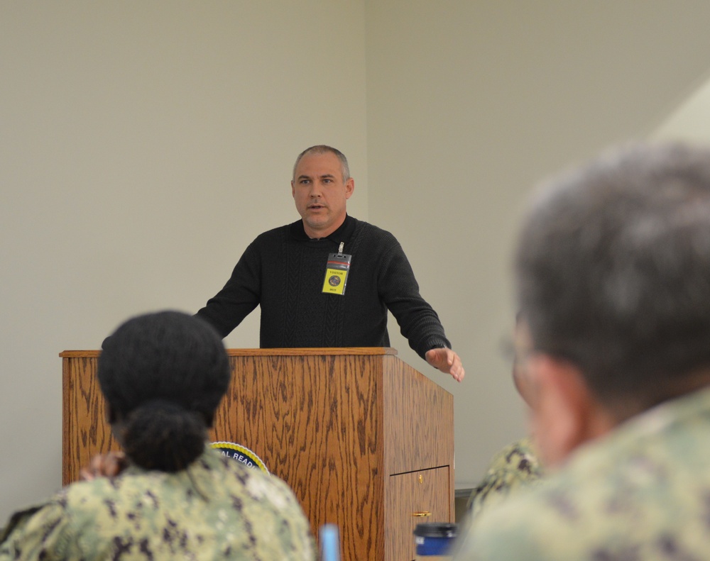 Naval Medical Readiness Logistics Command Sailors and Civilians receive a history presentation from Hampton Roads Naval Museum as part of African American History Month