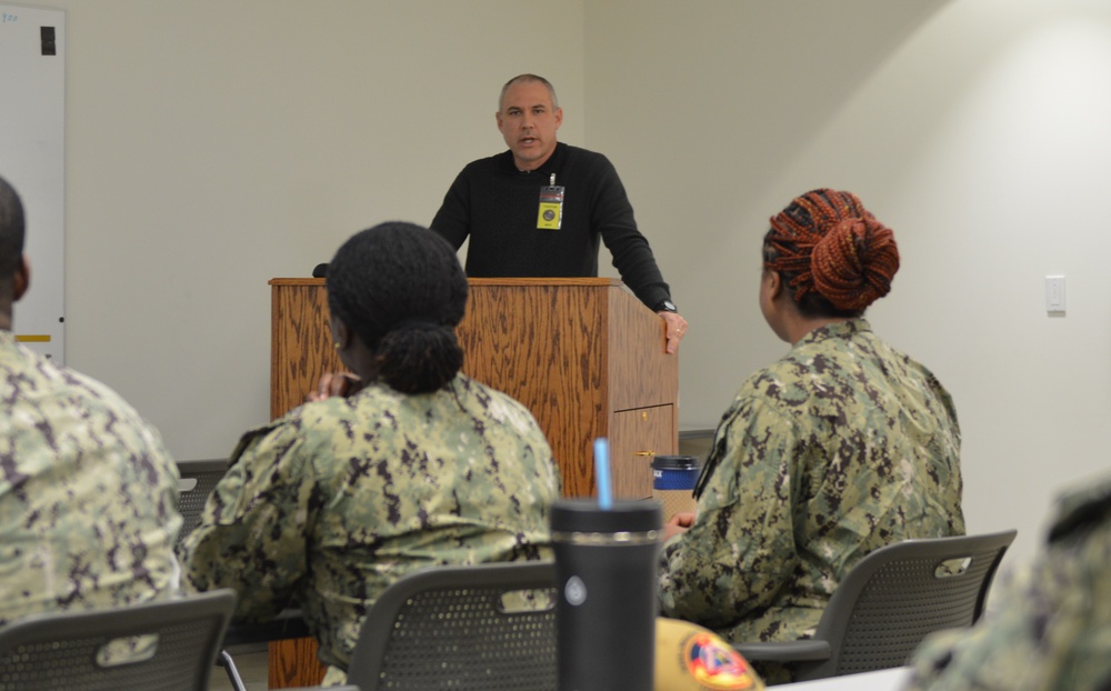 Naval Medical Readiness Logistics Command Sailors and Civilians receive a history presentation from Hampton Roads Naval Museum as part of African American History Month