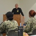 Naval Medical Readiness Logistics Command Sailors and Civilians receive a history presentation from Hampton Roads Naval Museum as part of African American History Month