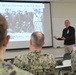 Naval Medical Readiness Logistics Command Sailors and Civilians receive a history presentation from Hampton Roads Naval Museum as part of African American History Month